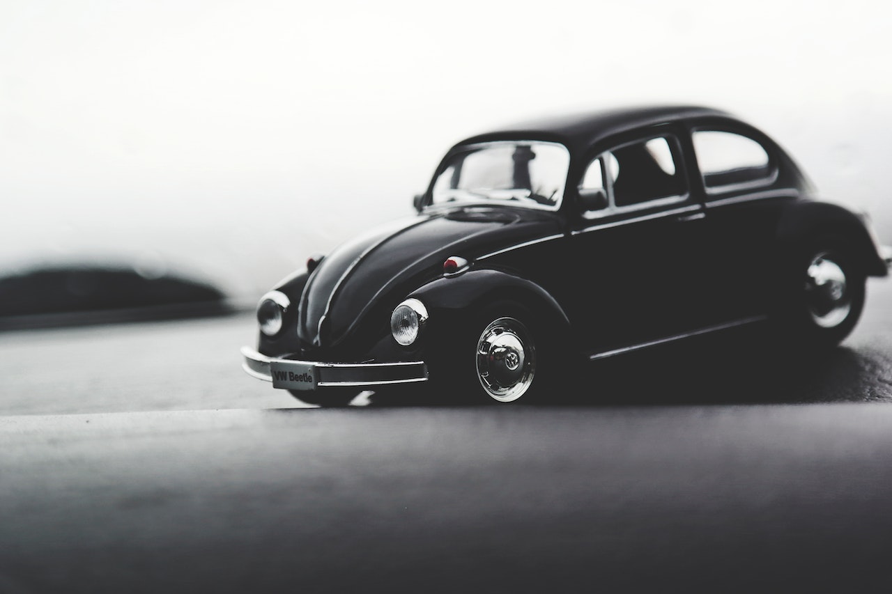 black volkswagen beetle why do people love classic automobiles